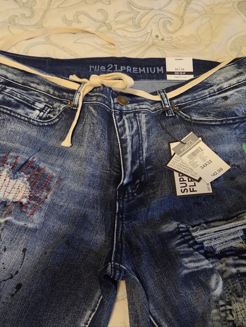 Rue21 Men's distressed blue denim jeans with cream drawstring 34x32